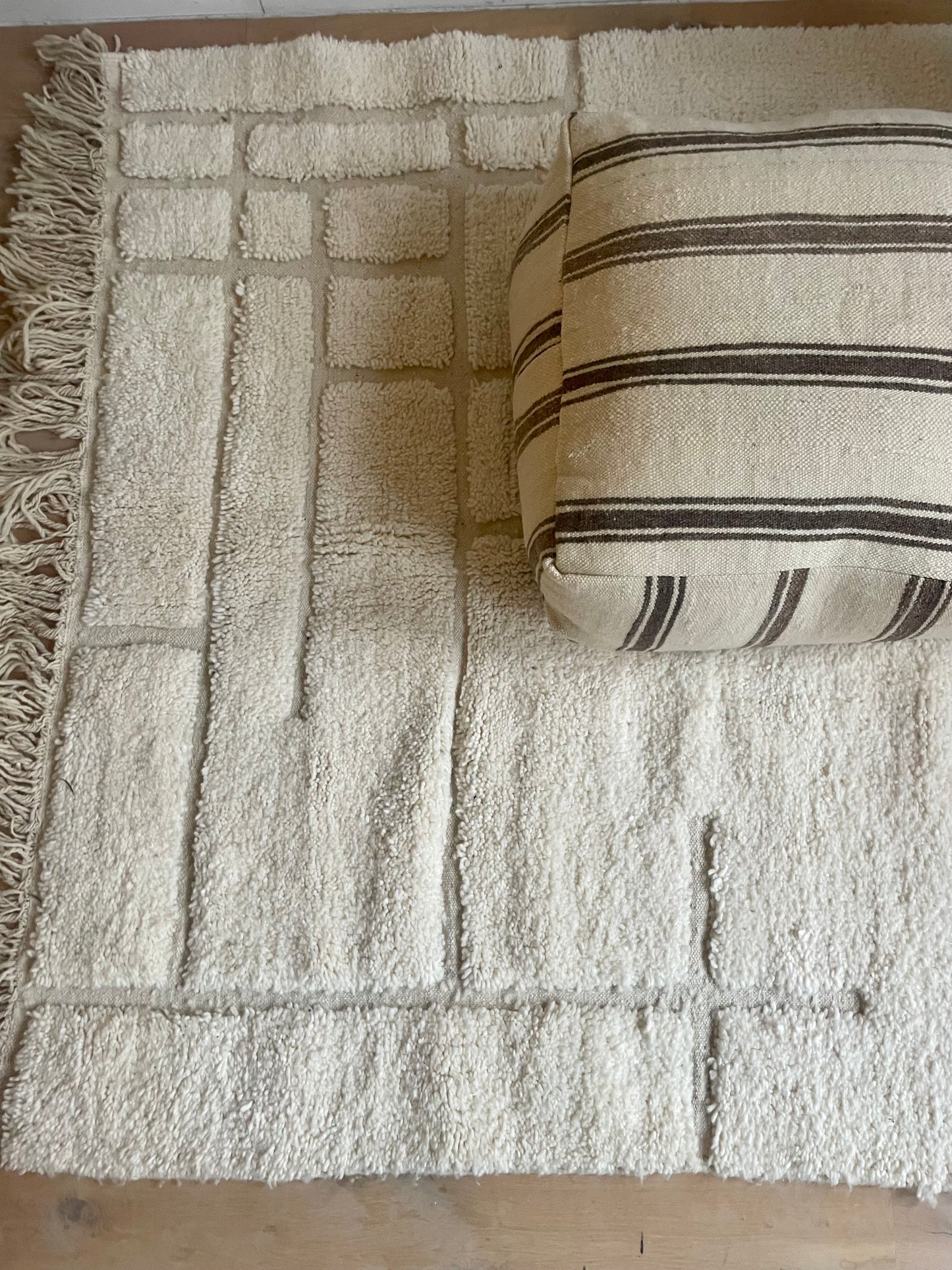 Brown striped pouf