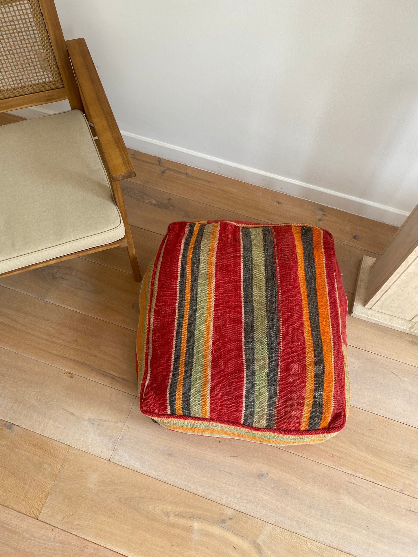 Colourful striped pouf