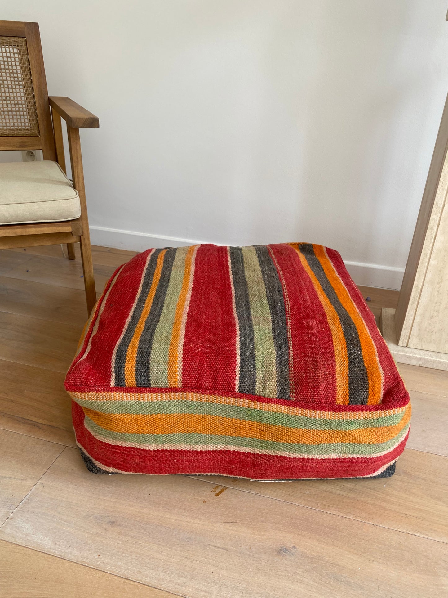 Colourful striped pouf