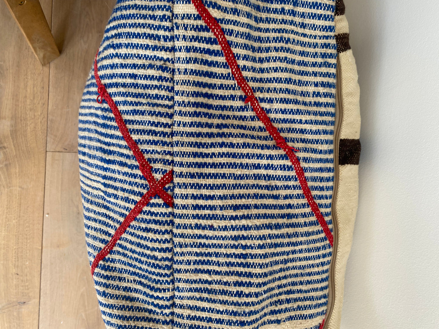 Blue/red striped pouf