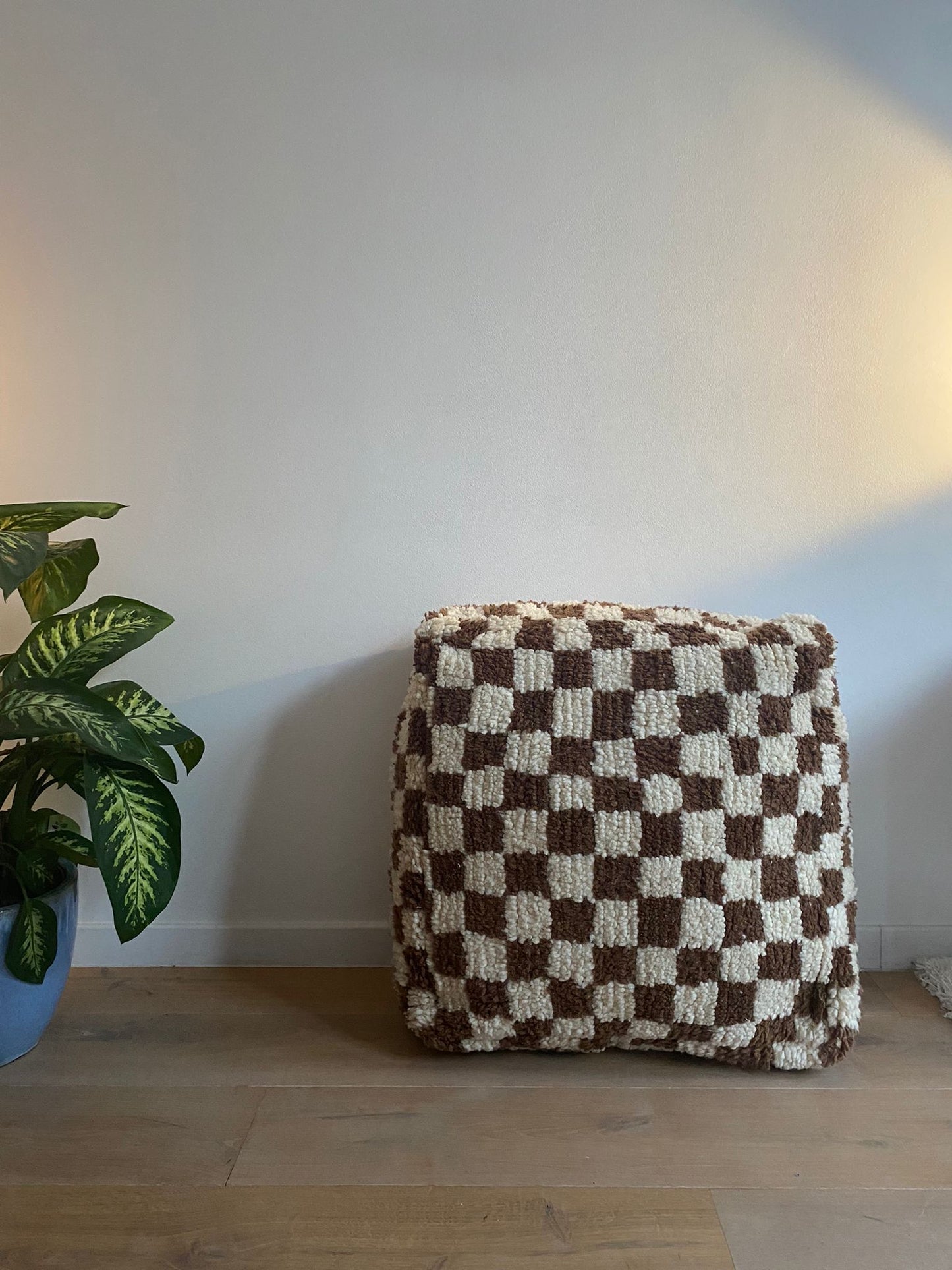 Brown checkered pouf