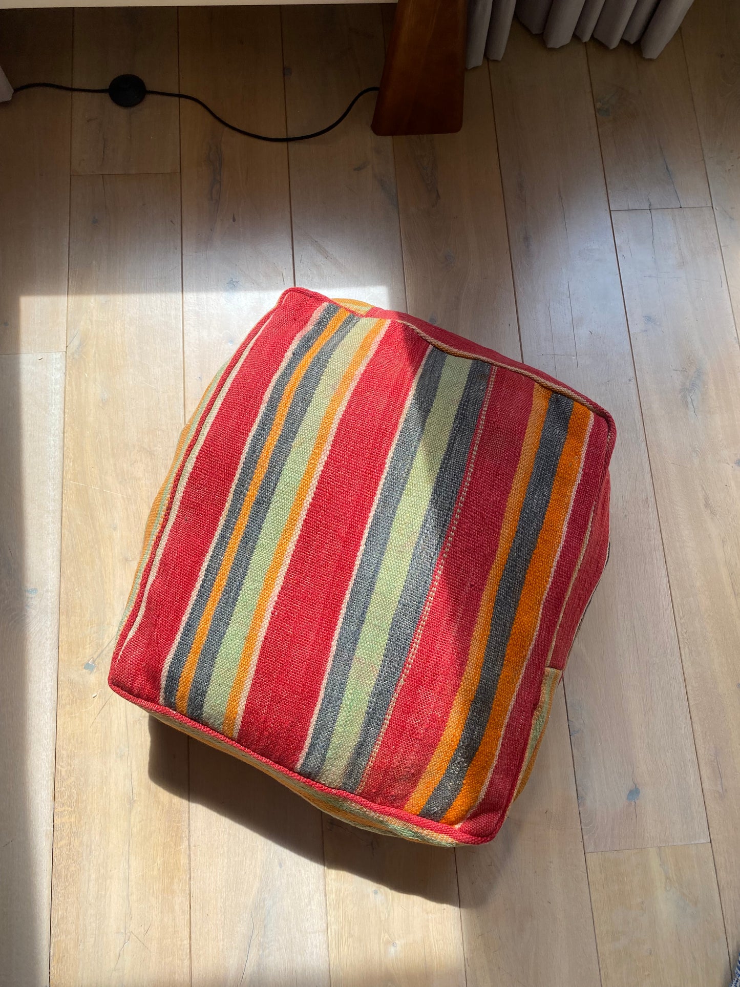 Colourful striped pouf