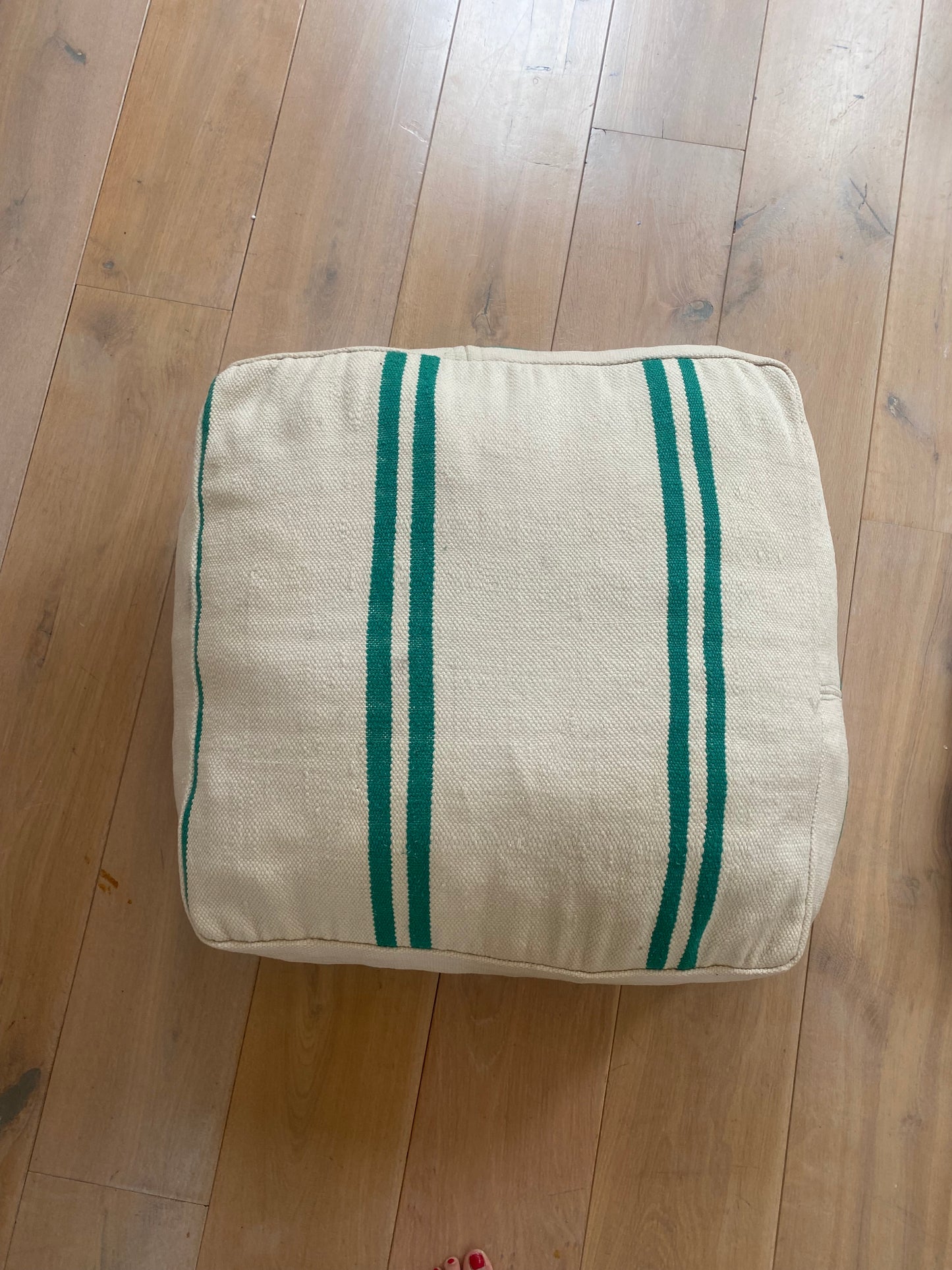 Green striped pouf