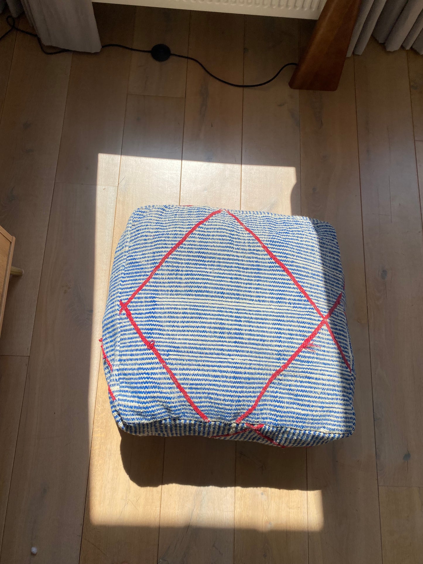 Blue/red striped pouf