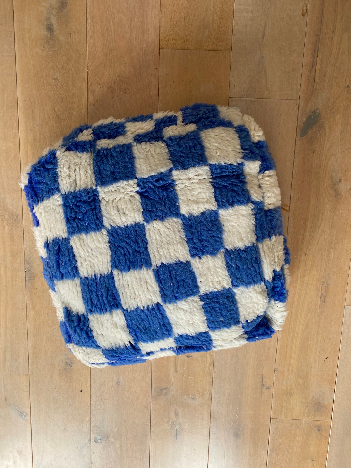 Blue checkered pouf